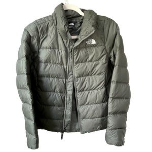 North face emerald green down waist length winter jacket. Size small.